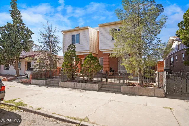a street view along with residential houses