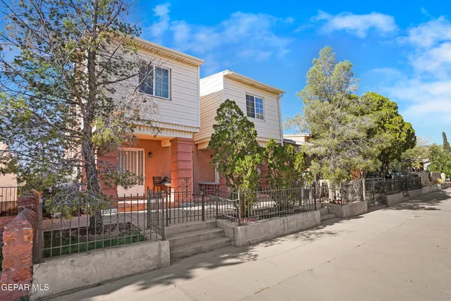 a view of a building with sitting area