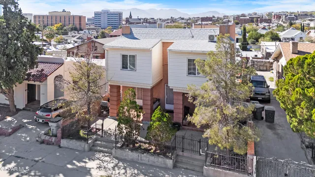 an aerial view of a city with lots of residential buildings