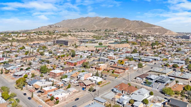 an aerial view of a house with a lot of residential houses