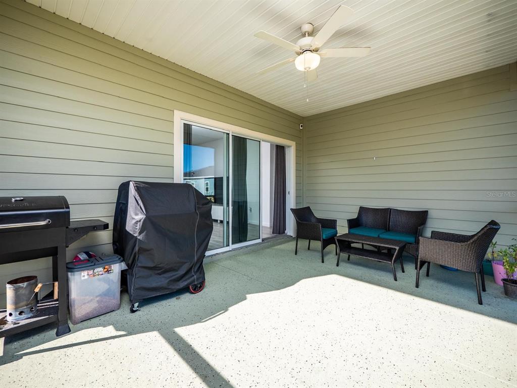 9052 Southwest 58th Circle Ocala, FL 34476 - Photo 13 of 19 a living room with furniture