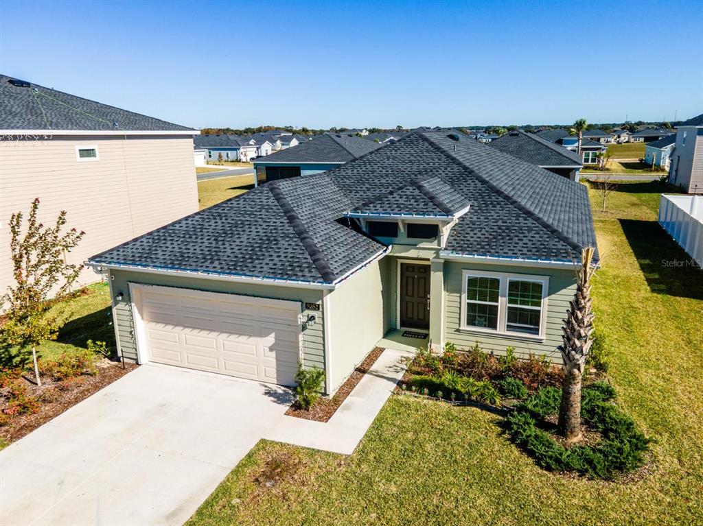 9052 Southwest 58th Circle Ocala, FL 34476 - Photo 2 of 19 a view of a house with a patio