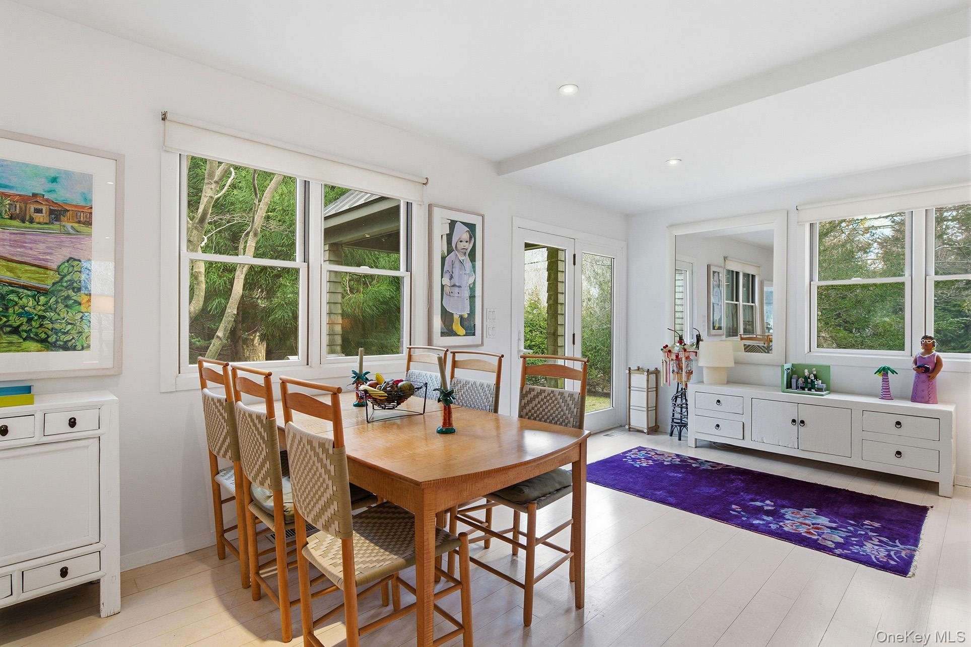 60 Skimhampton Road East Hampton, NY 11937 - Photo 10 of 37 a view of a dining room with furniture window and outside view