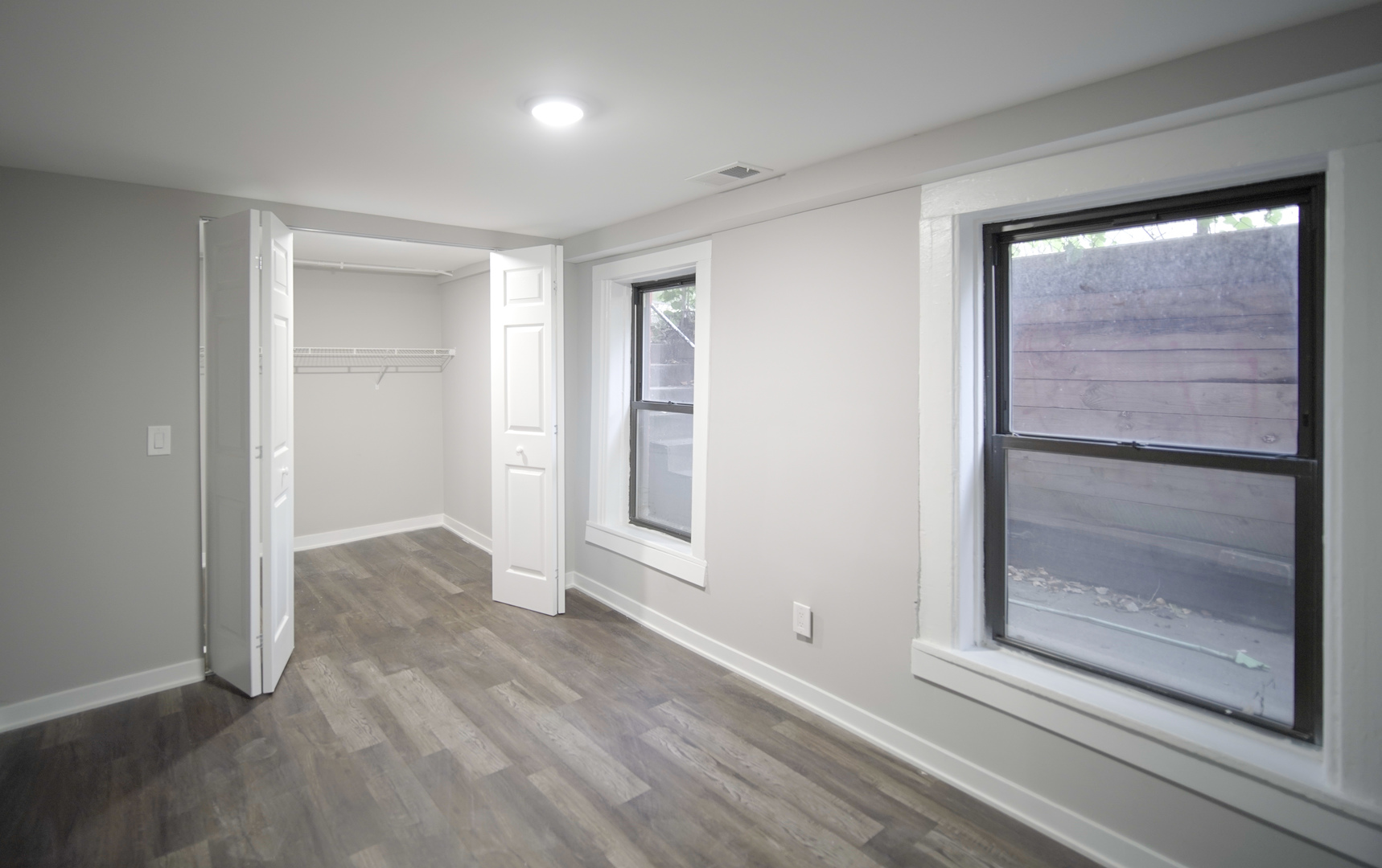 2235 West Cullerton Street Chicago, IL 60608 - Photo 14 of 15 an empty room with windows and closet