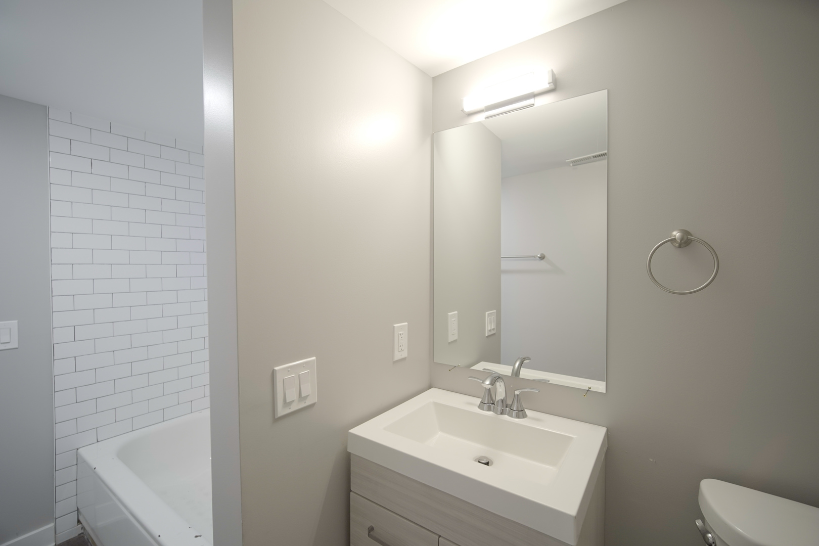 2235 West Cullerton Street Chicago, IL 60608 - Photo 15 of 15 a bathroom with a sink a toilet and shower