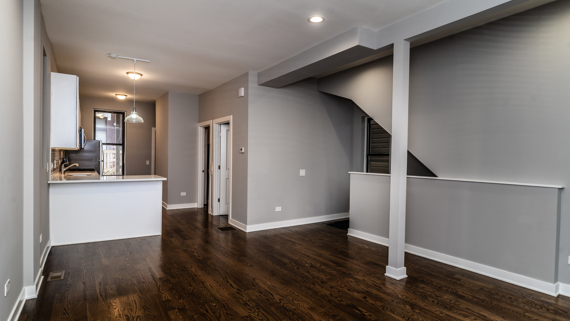 2235 West Cullerton Street Chicago, IL 60608 - Photo 4 of 15 a view of entryway with stairs and wooden floor