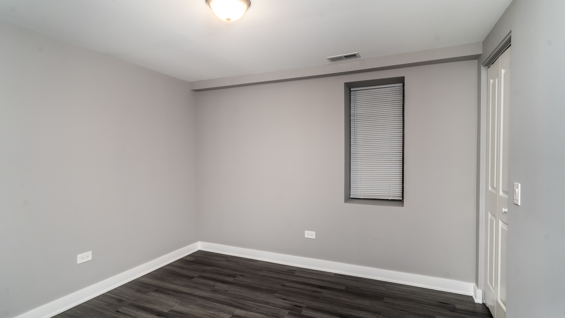 2235 West Cullerton Street Chicago, IL 60608 - Photo 7 of 15 a view of an empty room with wooden floor