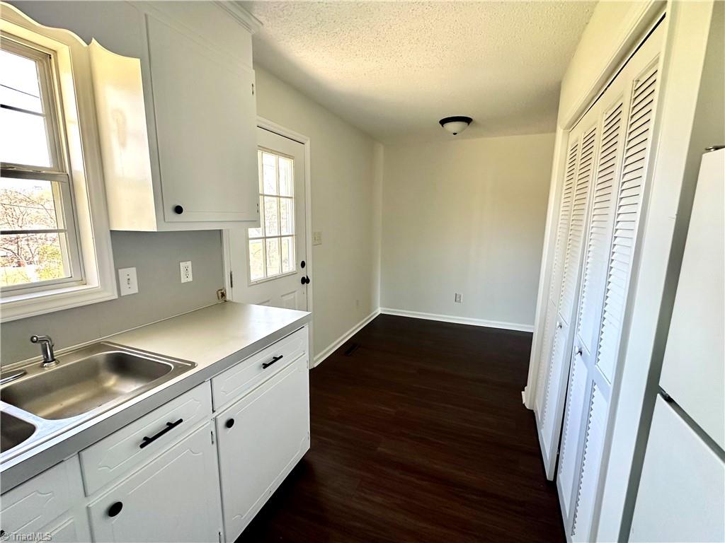 406 Dunbar Street Lexington, NC 27292 - Photo 7 of 23 Kitchen looking at dining area