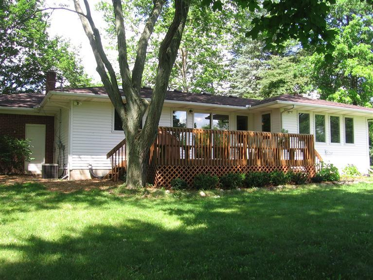 7450 Chamberlin Road Dexter, MI 48130 - Photo 2 of 36 Rear view and door into Garage.