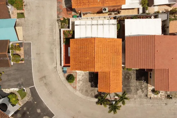 a kitchen with stainless steel appliances granite countertop a refrigerator a stove and a sink with granite countertops