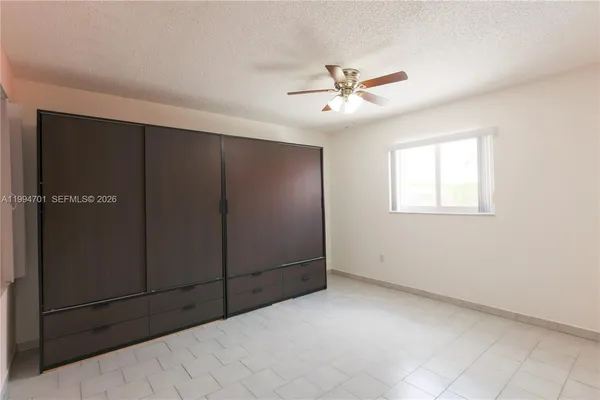 an empty room with closet