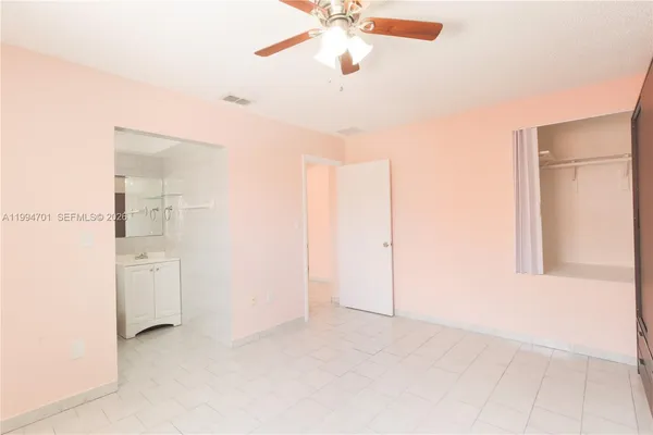 a bathroom with a toilet sink and bathtub