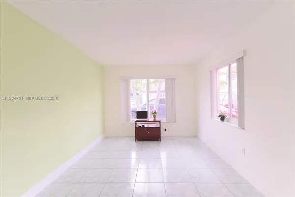 a view of kitchen and front door