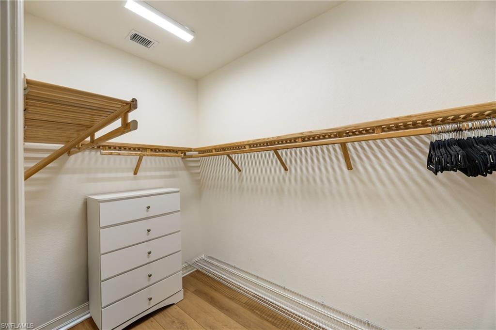 9128 Delano Street, Unit 892 Naples, FL 34113 - Photo 19 of 49 a view of walk in closet