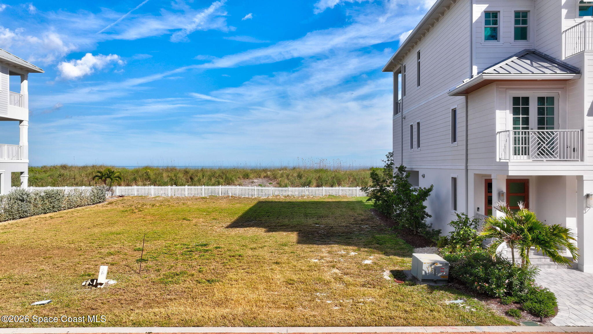 5144 Watersong Way Fort Pierce, FL 34949 - Photo 18 of 29 a view of an ocean with a house