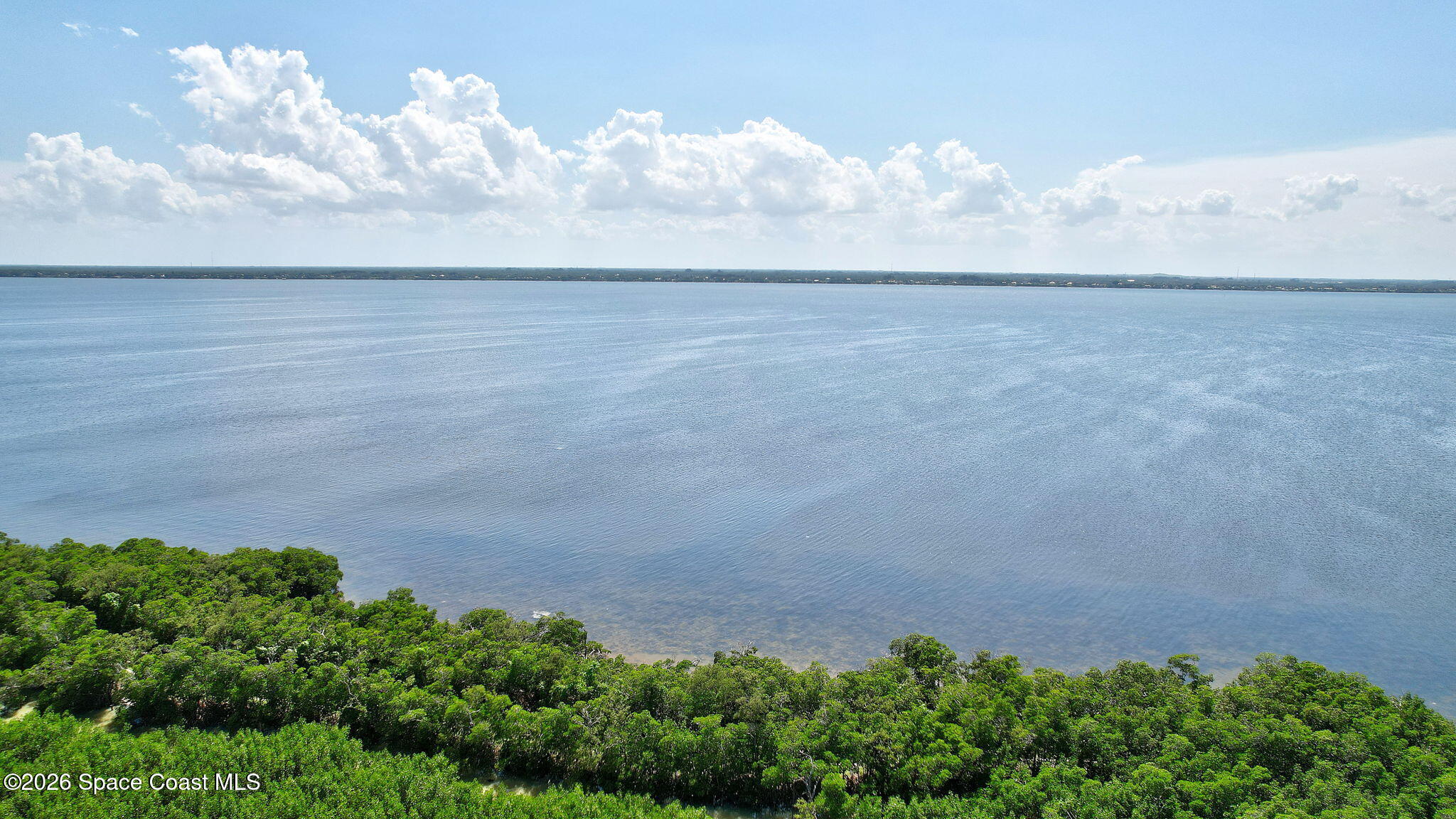 5144 Watersong Way Fort Pierce, FL 34949 - Photo 29 of 29 a view of beach and small yard