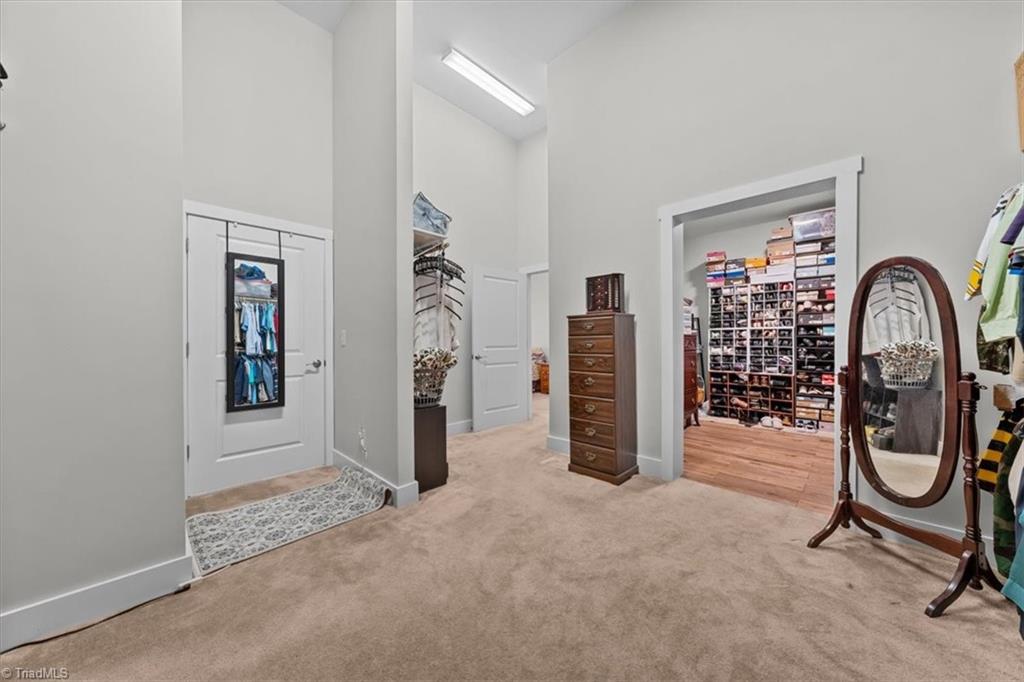 2207 Sierra Trace Road Denton, NC 27239 - Photo 23 of 49 Oversized walk-in closet with extensive storage and organization space