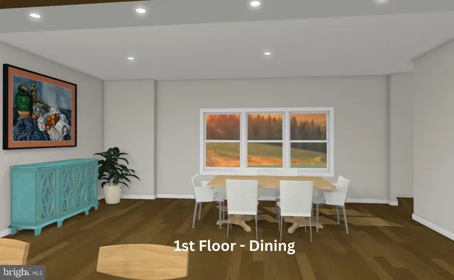 a view of a livingroom with furniture window and wooden floor