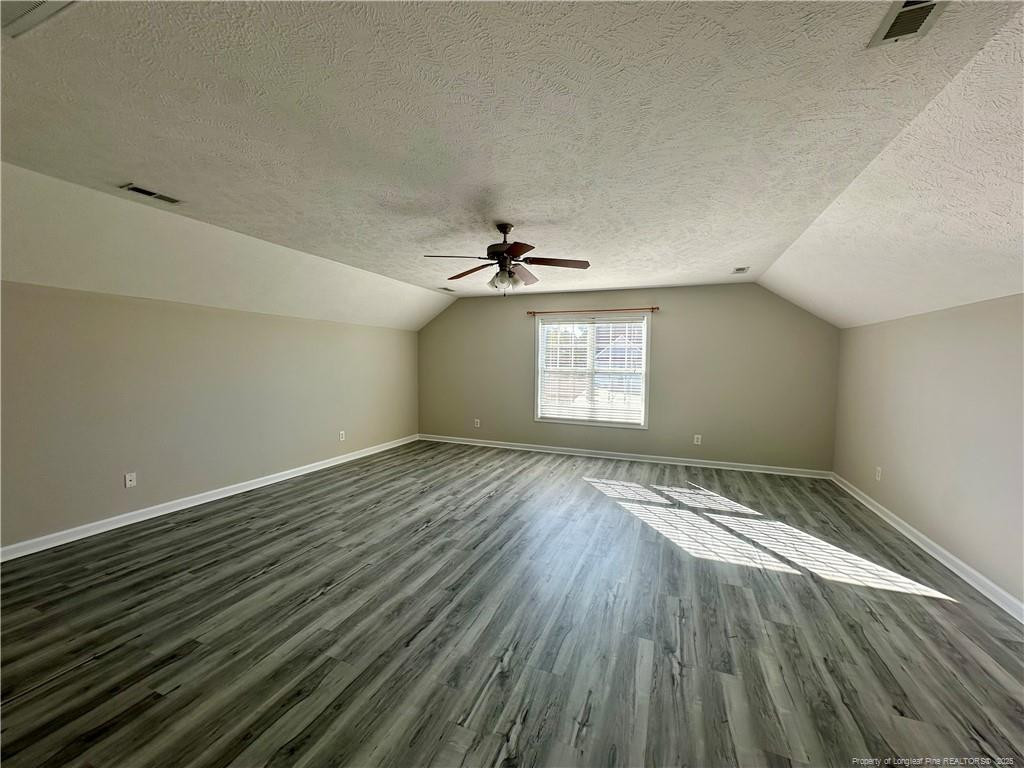 11 Lattimore Road Cameron, NC 28326 - Photo 12 of 18 wooden floor in an empty room with a window