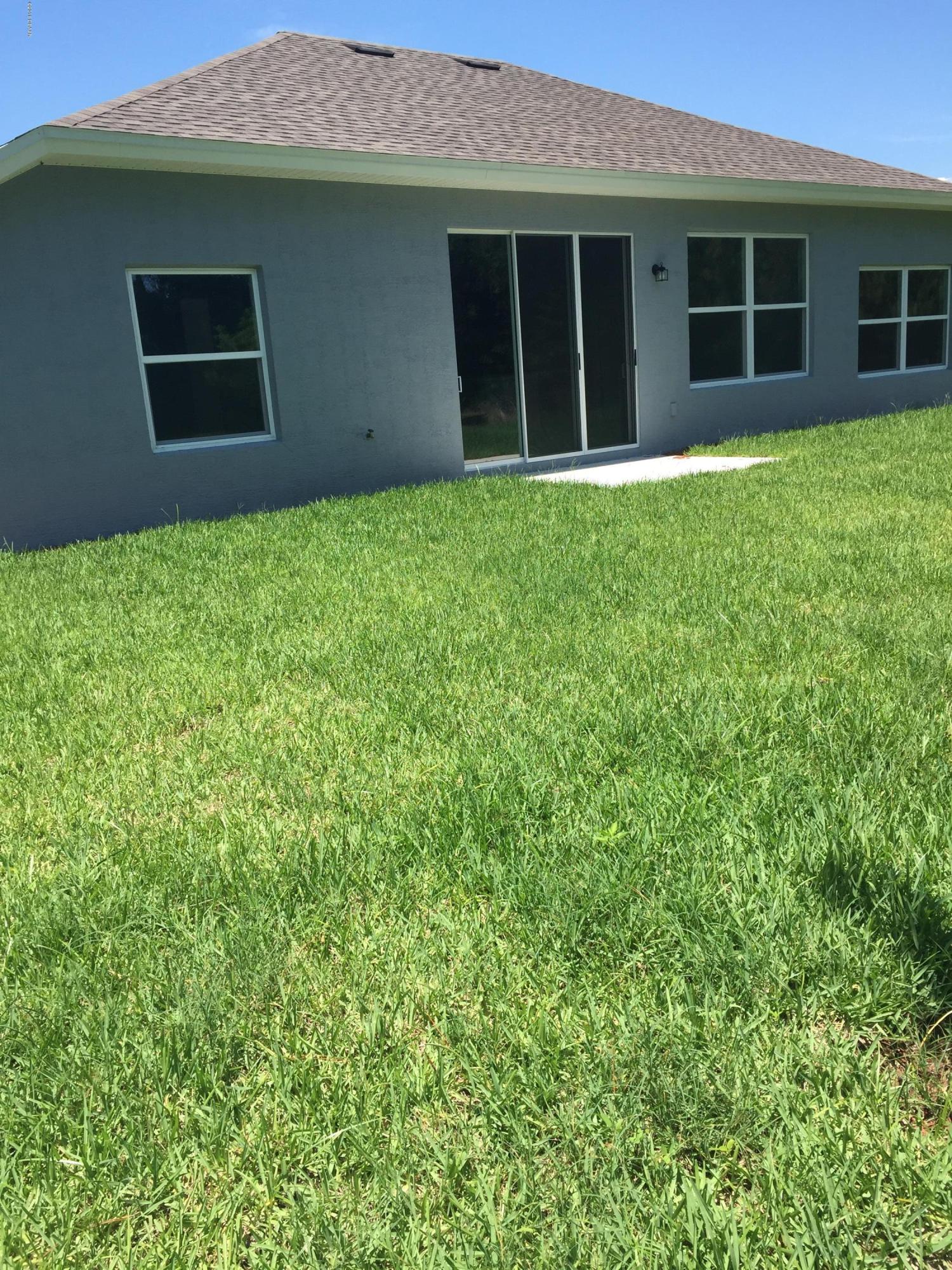 1425 Springleaf Drive Ormond Beach, FL 32174 - Photo 12 of 15 backyard