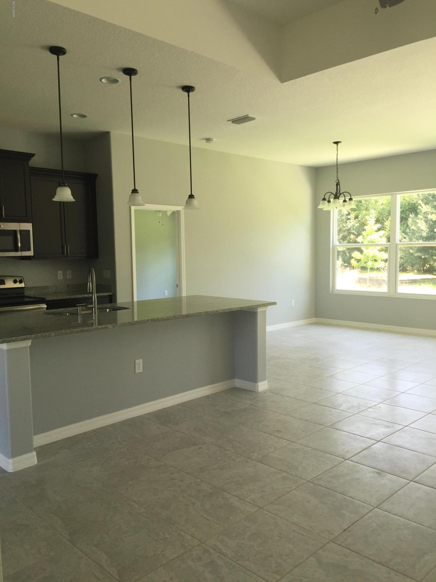 1425 Springleaf Drive Ormond Beach, FL 32174 - Photo 4 of 15 IMG_4376