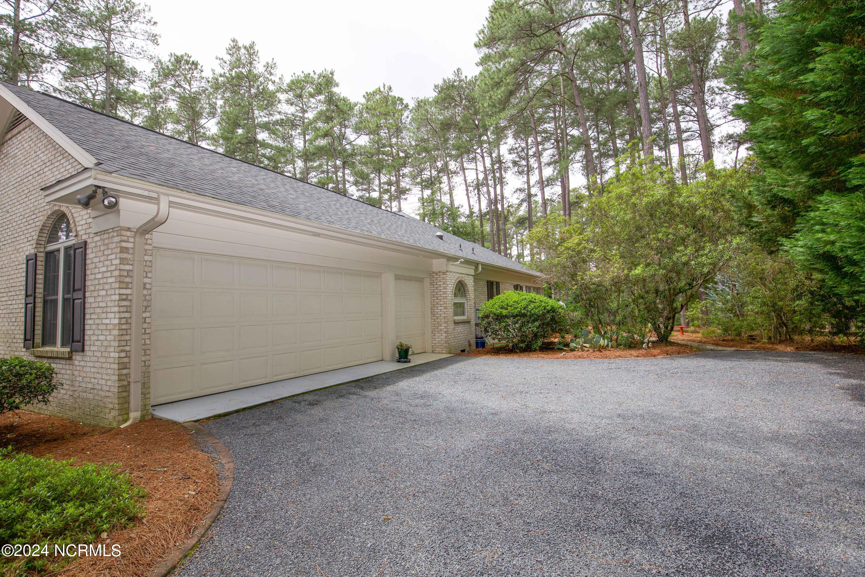 45 Pinewild Drive Pinehurst, NC 28374 - Photo 46 of 50 Side view Garage