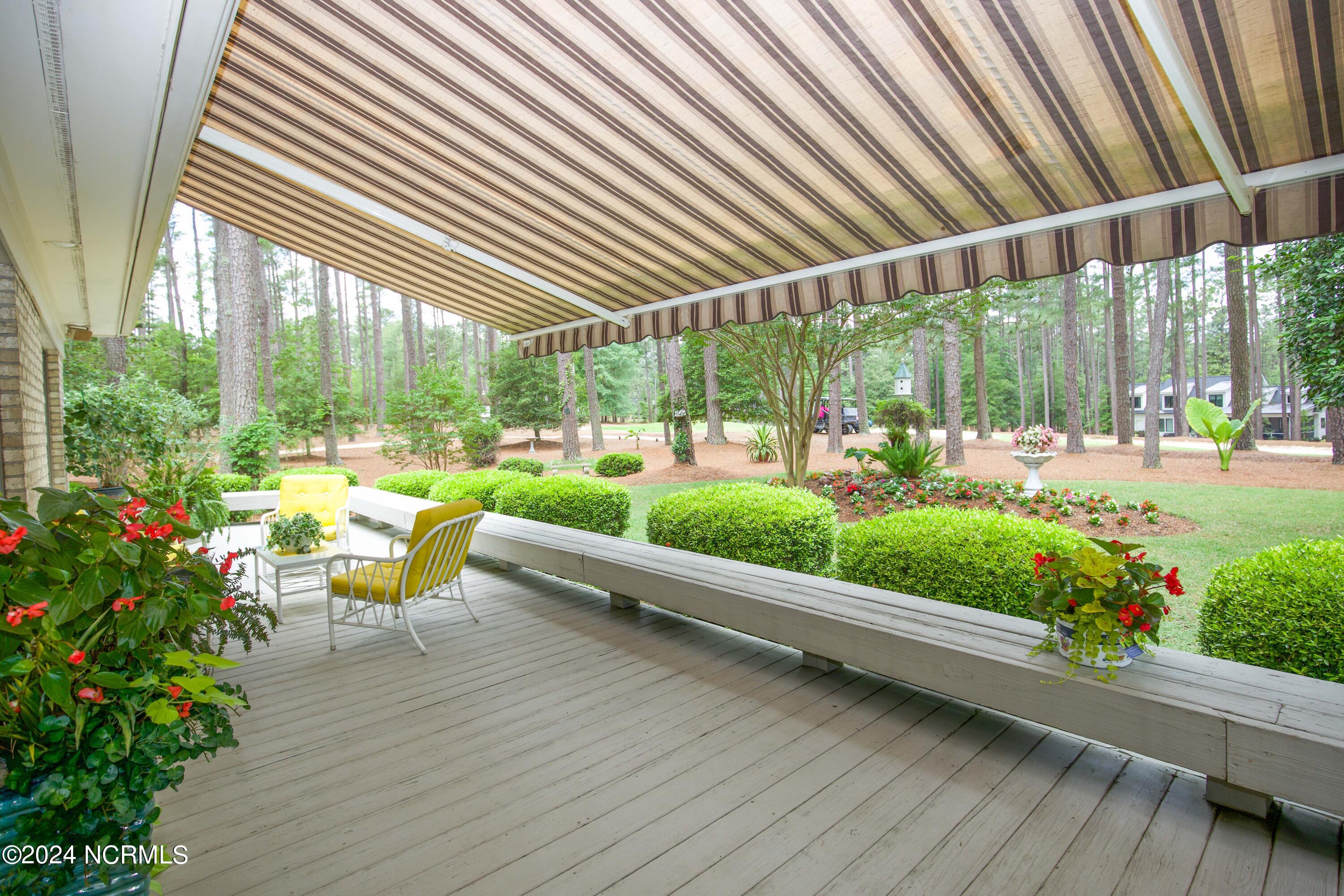 45 Pinewild Drive Pinehurst, NC 28374 - Photo 8 of 50 Patio/Deck w/Awning