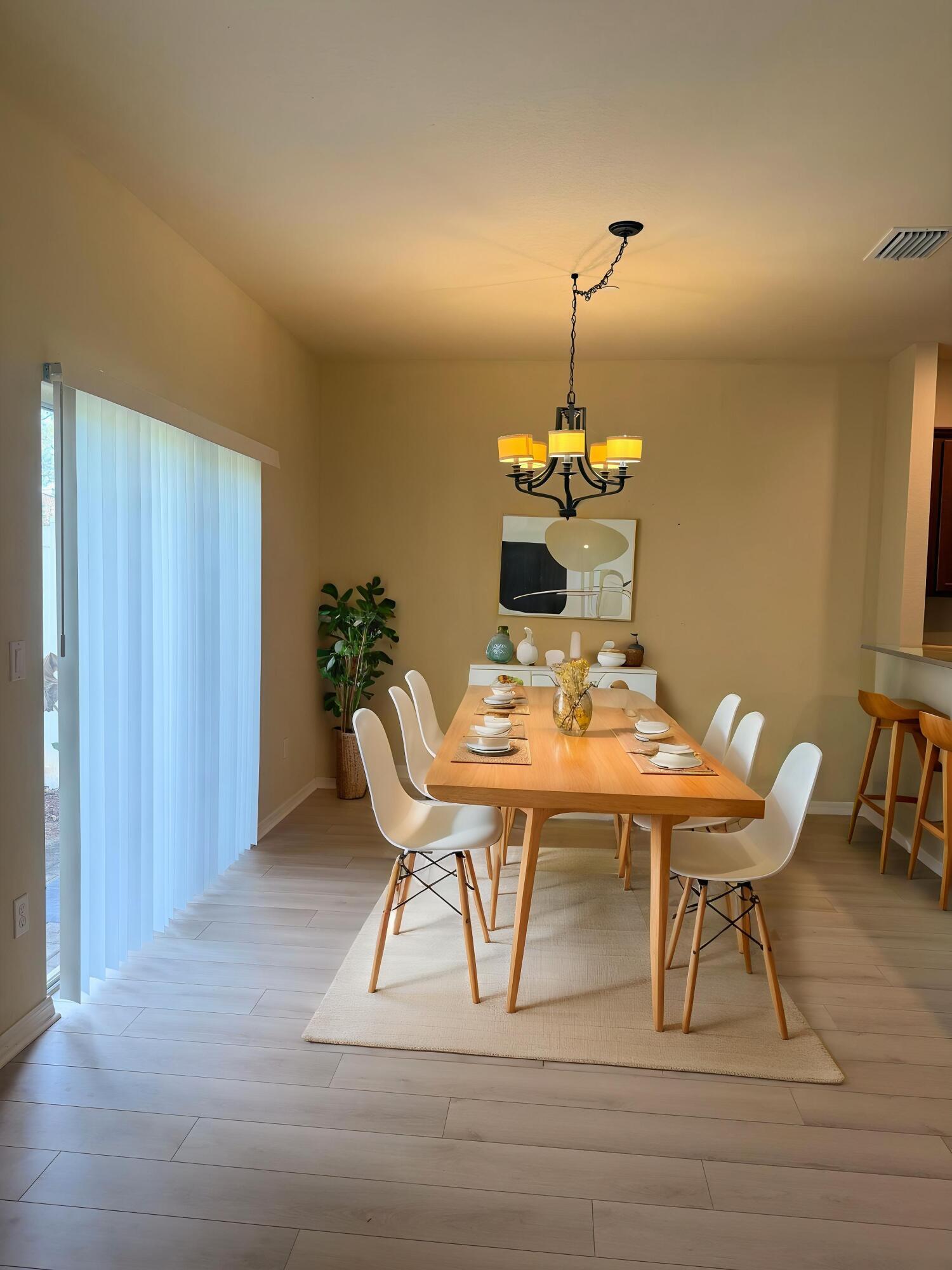 181 Southwest Otter Run Place Stuart, FL 34997 - Photo 8 of 20 Staged Dining area