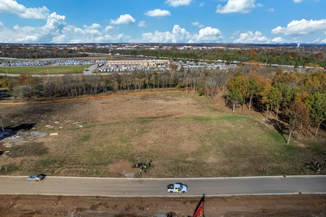 a view of a lake with a city