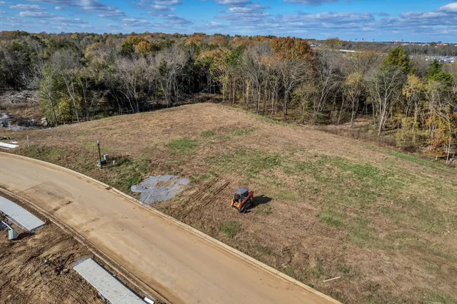a view of a backyard of a house