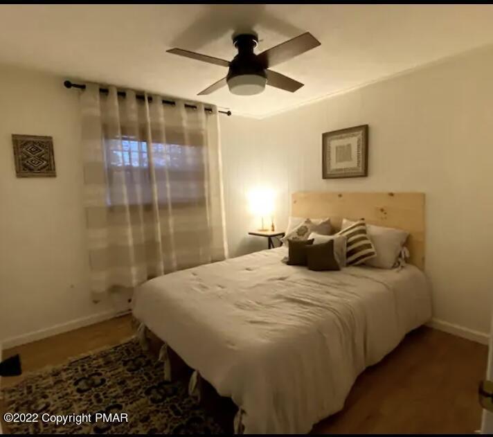 124 Bull Run Long Pond, PA 18334 - Photo 13 of 26 a bedroom with a bed and a shower
