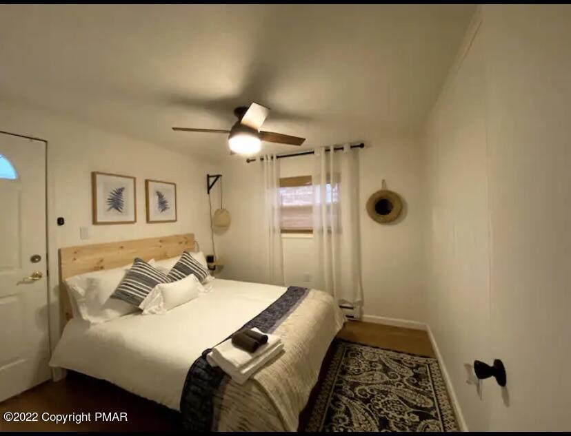 124 Bull Run Long Pond, PA 18334 - Photo 14 of 26 a bedroom with a bed and a window
