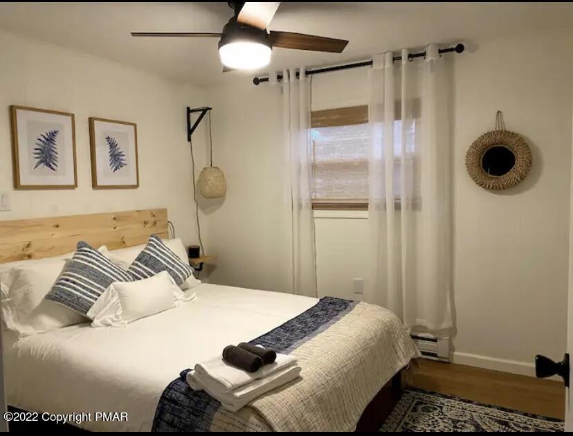 124 Bull Run Long Pond, PA 18334 - Photo 15 of 26 a bedroom with a bed and a window