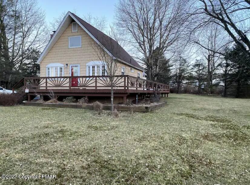 124 Bull Run Long Pond, PA 18334 - Photo 22 of 26 a view of a house with a yard