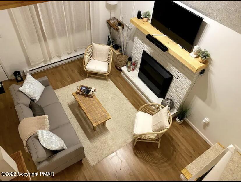 124 Bull Run Long Pond, PA 18334 - Photo 7 of 26 a living room with furniture and a flat screen tv