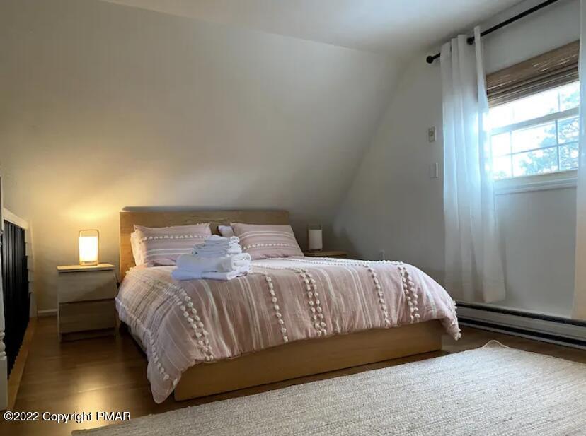124 Bull Run Long Pond, PA 18334 - Photo 10 of 26 a bedroom with a bed and a window