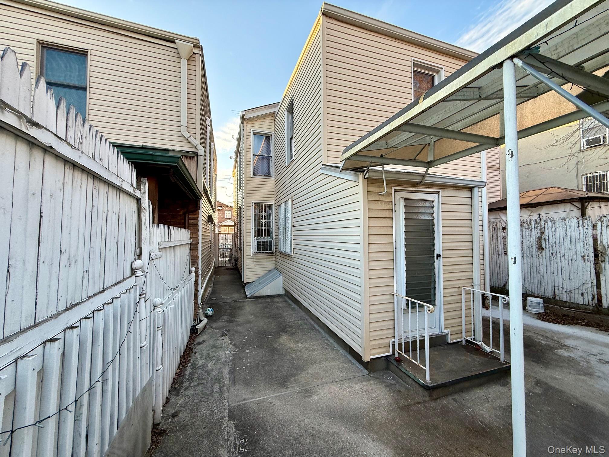 54-05 68th Street Queens, NY 11378 - Photo 2 of 47 View of property exterior