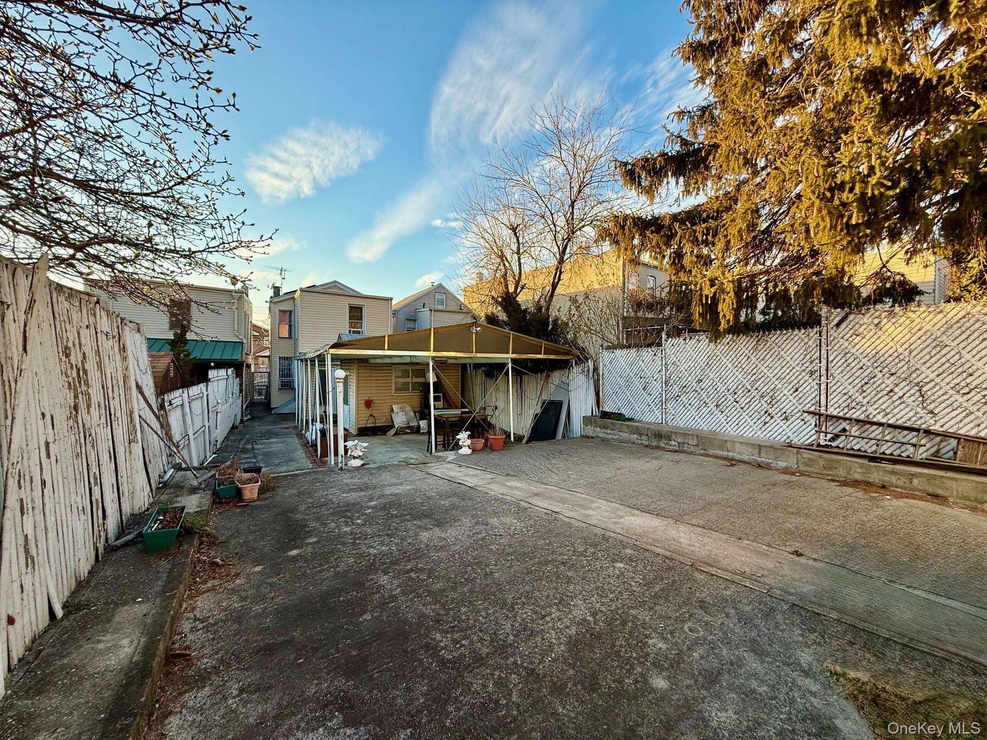 54-05 68th Street Queens, NY 11378 - Photo 43 of 47 Extra large courtyard with a fenced patio