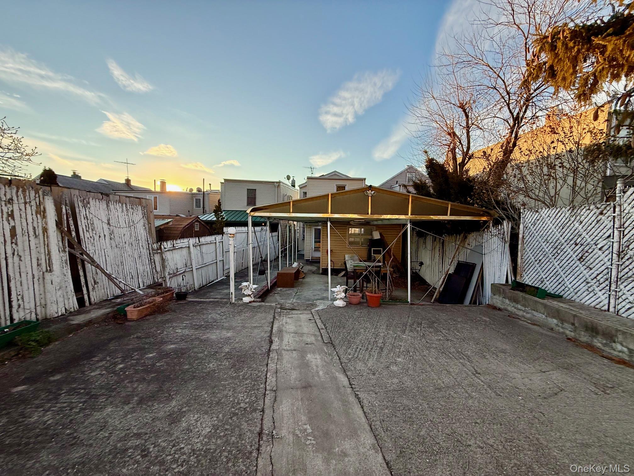 54-05 68th Street Queens, NY 11378 - Photo 44 of 47 Extra large courtyard with a fenced patio