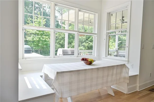 a kitchen with a sink a stove and a window