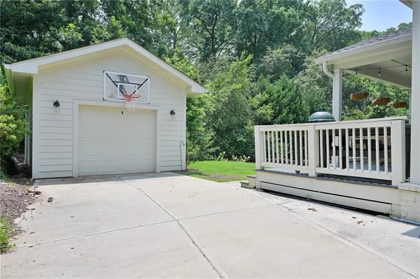 a front view of a house with a yard and porch