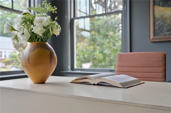 a vase of flowers sitting on a table