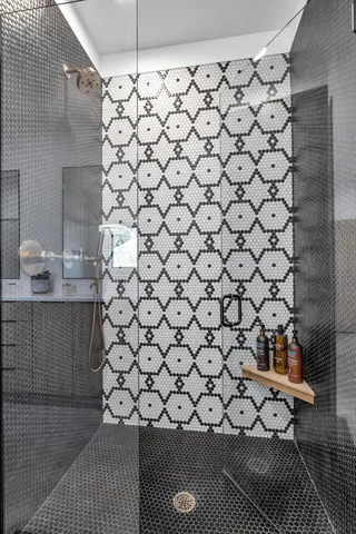 a bathroom with a sink and a shower