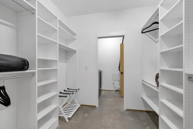 a view of an empty walk in closet