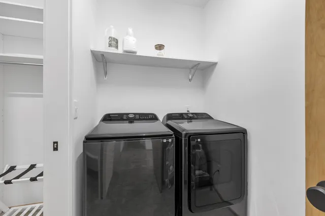 a utility room with dryer and washer