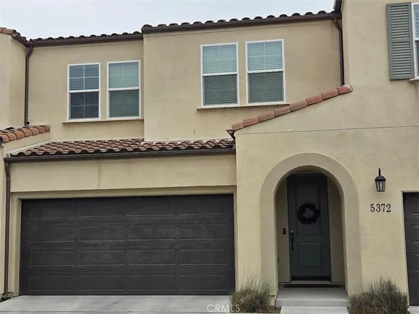 a front view of a house with an outdoor space