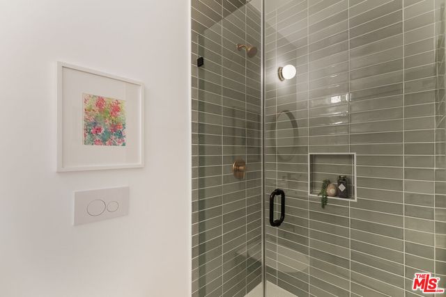 a front view of a house with parking space