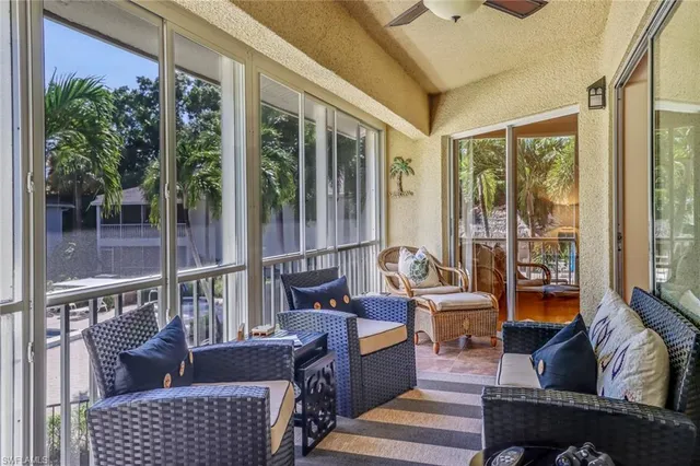 a outdoor living space with furniture and a potted plant