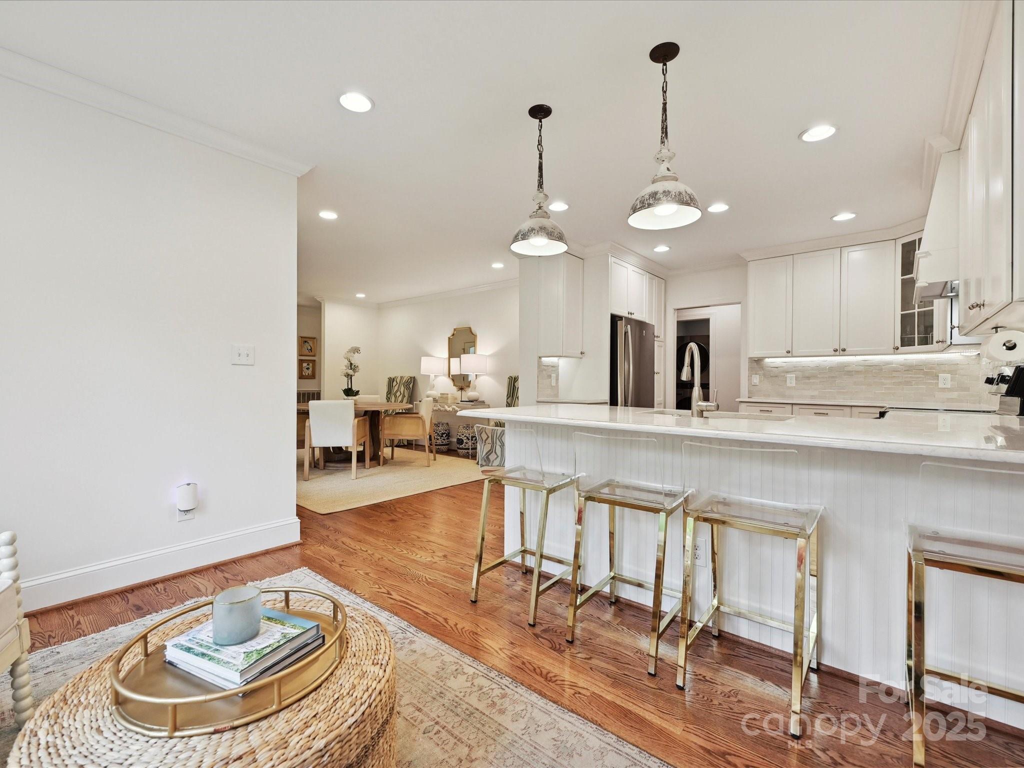 3610 Mill Pond Road Charlotte, NC 28226 - Photo 11 of 35 a large kitchen with a table and chairs