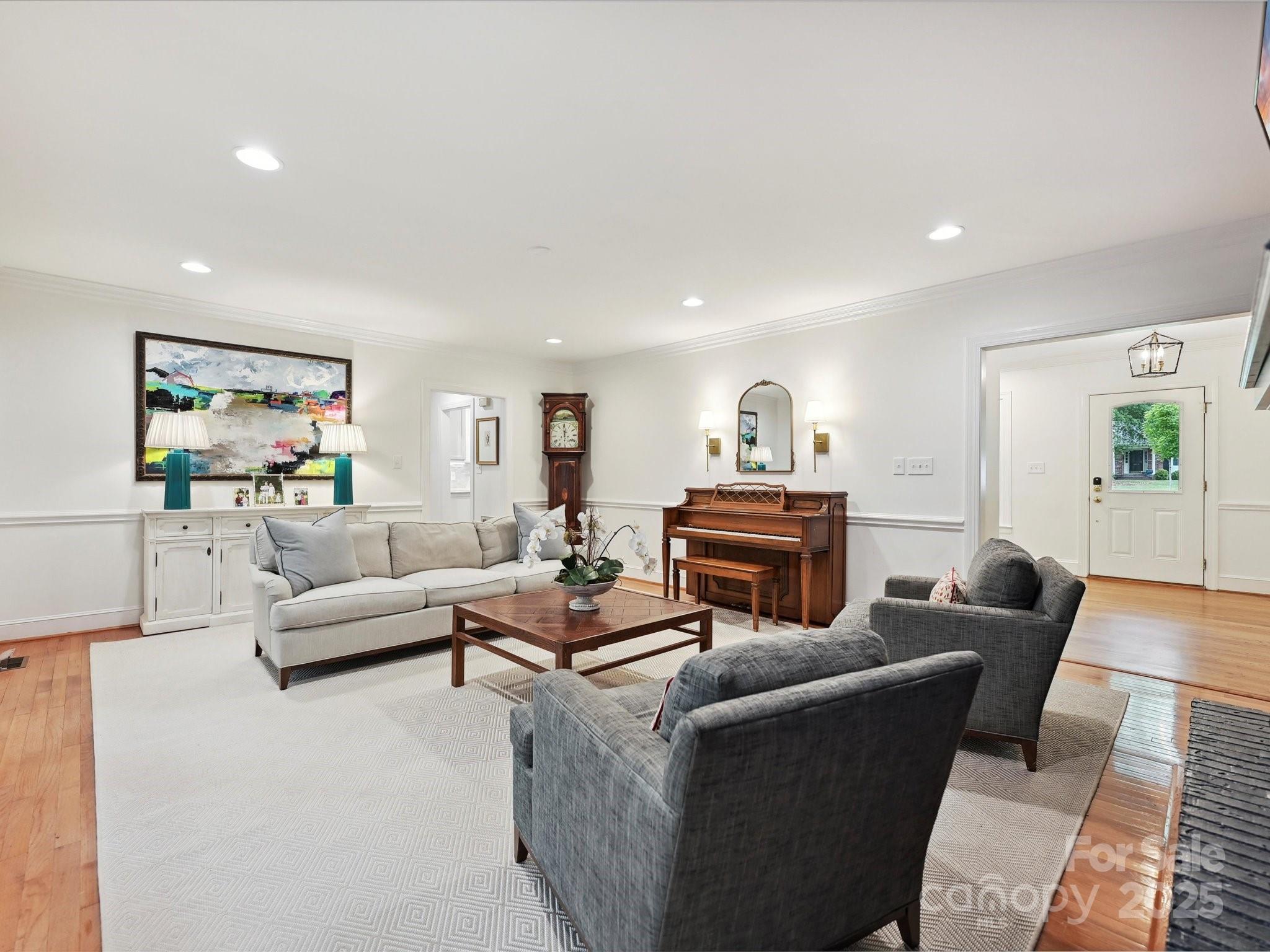3610 Mill Pond Road Charlotte, NC 28226 - Photo 12 of 35 a living room with furniture and a fireplace